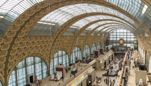 Paris, France, March 28 2017: Visitors in the Musee d’Orsay in Paris, France. The museum houses the largest collection of impressionist and post-impressionist masterpieces