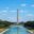 Washington Monument reflected in the lake at sunrise—an iconic scene often explored on Washington DC school trips highlighting national identity and symbolism.