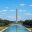 Washington Monument reflected in the lake at sunrise—an iconic scene often explored on Washington DC school trips highlighting national identity and symbolism.