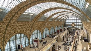 Paris, France, March 28 2017: Visitors in the Musee d’Orsay in Paris, France. The museum houses the largest collection of impressionist and post-impressionist masterpieces