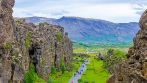 UK school group exploring a glacier on a geography trip to Iceland