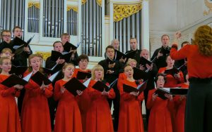 Group of people singing in choir