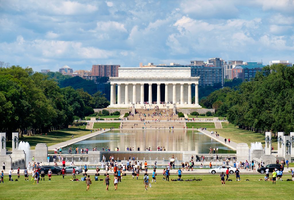 View from the Lincoln Memorial looking over the Reflecting Pool towards the Washington Monument—iconic scene on Washington DC school trips linking history and civic identity.