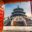 The Temple of Heaven in Beijing, China, viewed through an open red gate adorned with golden studs. The circular, multi-tiered blue and gold temple rises behind a broad staircase, with visitors ascending the steps under a clear sky.