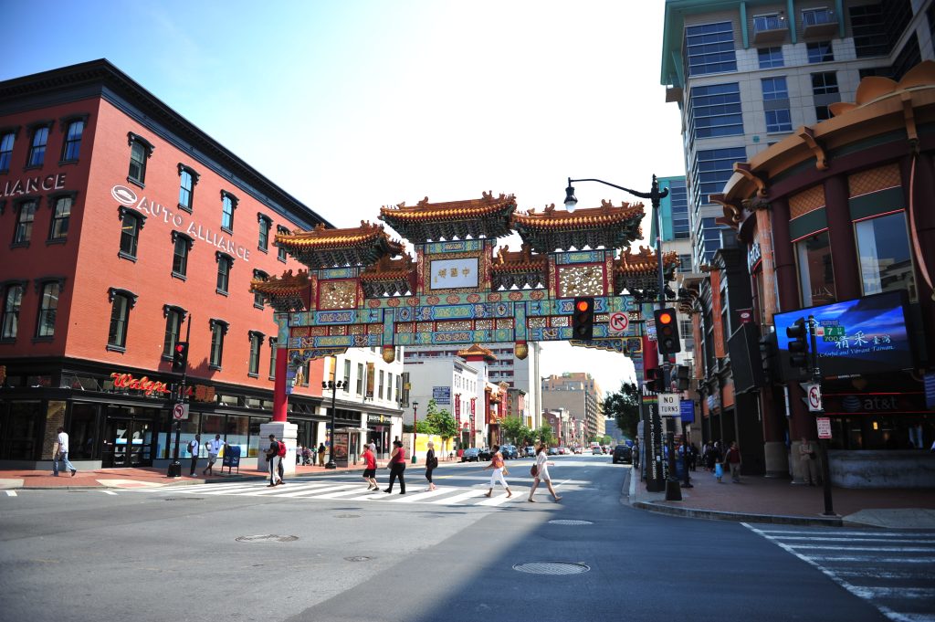 Students walking beneath the Friendship Archway in Washington DC’s Chinatown—an ideal stop on school trips exploring immigration, culture, and urban diversity.